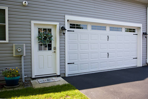 24/7 Emergency Garage Door Panel Replacement experts in Kinsley, KS